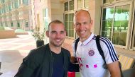 Al Gharafa’s Dutch player Wesley Sneijder (left)  poses for a photograph with Bayern Munich’s Arjen Robben in Doha.
