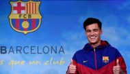 Barcelona's new Brazilian midfielder Philippe Coutinho poses for a picture in Barcelona on January 7, 2018. AFP / Josep LAGO
