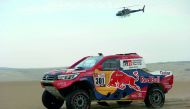 Nasser Al Attiyah of Qatar and co-pilot Matthieu Baumel from France drive their Toyota during the 2018 Dakar Rally Stage 2 in and around the Peruvian town of Pisco, yesterday.