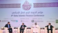 FROM LEFT: Ahmed Hafez, Moderator; Dr Sayed Nizam Ali, Director and Research Professor at HBKU; Dr Haitham Al Salama, Chief Economic Adviser at QFC Authority; and Gourang Hemani, Chief Financial Officer at QIB; in a panel discussion during the 4th Doha Is