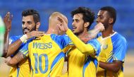Al Gharafa players celebrate a goal during the QNB Stars League match in this file picture.