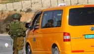 Israeli soldiers check vehicles after a Jewish settler was killed at Havat Gilad Jewish settlement neighborhood in Nablus, West Bank on January 10, 2018. (Nedal Eshtayah / Anadolu Agency)

