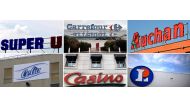 This combination of photos shows (top row from L) a logo of a Super U store in Herouville-Saint-Clair, French supermarket giant Carrefour in Villiers-en Biere, the sign of the Auchan supermarket in Toulouse, (back row from L) the Celia dairy company's inf