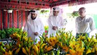 Youssef Khalid Al Khulaifi, Agricultural Affairs Department Director (left), and Abdul Rehman Al Sulaiti (centre), General Supervisor of Agricultural Product Yards with other officials on the Opening of flower festival at Al- Mazrouah yard near Umm Salal 
