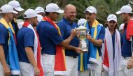 Team Europe's captain Thomas Bjorn (C) and team members hold the trophy after they won the 2018 Eurasia Cup Golf tournament at the Glenmarie Golf and Country club in Shah Alam, near Kuala Lumpur on January 14, 2018. / AFP / MOHD RASFAN