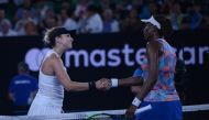 Belinda Bencic of Switzerland (L) shakes hand with Venus Williams of the United States on day one of the 2018 Australian Open at Melbourne Park on January 15, 2018 in Melbourne, Australia. ( Recep ?akar - Anadolu Agency )