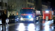 Fire fighters arrive at the scene after an explosion that caused a residential building to collapse in Antwerp district of Brussels, Belgium on January 16, 2018.  ( Dursun Aydemir - Anadolu Agency )