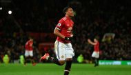 Manchester United's French striker Anthony Martial celebrates scoring their second goal during the English Premier League football match between Manchester United and Stoke City at Old Trafford in Manchester, north west England, on January 15, 2018.   AFP