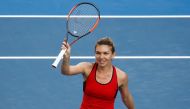 Simona Halep of Romania celebrates winning against Naomi Osaka of Japan. REUTERS/Thomas Peter