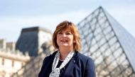 Scotland's external affairs minister Fiona Hyslop poses in front of the Louvre Pyramid designed by Chinese-born U.S. Architect Ieoh Ming Pei in Paris, France, September 26, 2016. Reuters/Charles Platiau