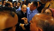 FILE PHOTO: Egypt's former army chief of staff Sami Anan, leaves a news conference at his office in Cairo, March 13, 2014. Reuters/Mohamed Abd El Ghany