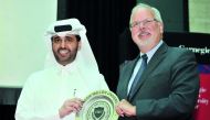 Abdulaziz bin Nasser Al Khalifa, QDB CEO presented with a shield by Michael Trick, Dean of Carnegie Mellon during Dean’s Lecture Series held at Carnegie Mellon University- Qatar, yesterday.