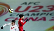 Action from the Under-23 ASian Cup  semi-final match between Qatar and Vietnam in Changzhou, China yesterday. Vietnam won 6-5 in the penalty shoot-out.
