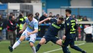 Spal's Slovenian midfielder Jasmin Kurtic (L) vies with Inter Milan's Slovakian defender Milan Skriniar and Inter Milan's Italian defender Danilo D'Ambrosio during the Italian Serie A football match Spal vs Inter Milan at the Paolo Mazza stadium in Ferrar