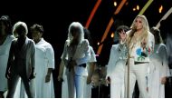Kesha (R), Cyndi Lauper (C) and Bebe Rexha (L) perform 