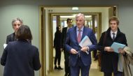 European Union Chief Negotiator in charge of Brexit negotiations Britain Michel Barnier (C) arrives for a General affairs council debate on the article 50 concerning Brexit in Brussels at the EU headquarters in Brussels on January 29, 2018.  AFP / JOHN TH