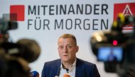 German district manager of IG Metall (Industrial Union of Metalworkers), Roman Zitzelsberger talks to the press before the fourth round of negociations between representatives of IG Metall and employers on January 24, 2018 in Boeblingen.  AFP / DPA / Seba