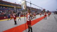 Formula One grid girls are seen before the start of the Singapore F1 Grand Prix at the Marina Bay street circuit in Singapore September 23, 2012. Reuters/Edgar Su