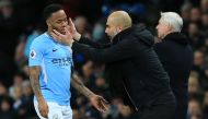 Manchester City's Spanish manager Pep Guardiola (R) gestures to Manchester City's English midfielder Raheem Sterling (L) during the English Premier League football match between Manchester City and West Bromwich Albion at the Etihad Stadium in Manchester,