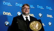 Director Guillermo del Toro holds his award for Outstanding Directorial Achievement in Feature Film for 