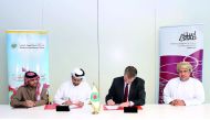 STAD CEO Ali Al Khalifa (second left) and PDO Managing Director Raoul Restucci (second right) signing the MoU.