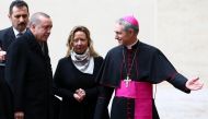 Turkish President Tayyip Erdogan is welcomed by archbishop Georg Ganswein as he arrives to attend a private audience with Pope Francis at the Vatican February 5, 2018. REUTERS/Alessandro Bianchi

