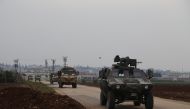 Turkish armored vehicles move towards Hassa district of Hatay, Turkey as part of the 
