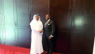 H E Dr Mohammed bin Saleh Al Sada (left),Minister of Energy and Industry,  shaking hands with the visiting Minister of Energy of Sierra Leone Henry Olufemi Macauley, in Doha, yesterday.  