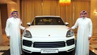 Salman Jassem Al Darwish, (right) Chairman and CEO of Porsche Centre Doha with Ahed Dawood, Brand Manager, Porsche Center Doha, during the launch of new model of Porsche Cayenne in Doha, yesterday. Pic: Abdul Basit