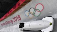 Team leader and driver Jazmine Fenlator-Victorian of Jamaica corners in the second women's unofficial bobsleigh training session at the Olympic Sliding Centre, ahead of the Pyeongchang 2018 Winter Olympic Games, in Pyeongchang on February 8, 2018. AFP / M