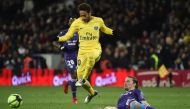 Toulouse's French midfielder Yannick Cahuzac (R) tackles Paris Saint-Germain's Brazilian forward Neymar Jr during the French L1 football match between Toulouse (TFC) and Paris Saint-Germain (PSG) on February 10, 2018 at the Municipal stadium in Toulouse. 