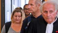File photo of Cecile Bourgeon (L), mother of the late Fiona, arriving with her lawyer Gilles-Jean Portejoie (R) at the court of Riom, central France, September 5, 2016.  / AFP / Thierry Zoccolan
