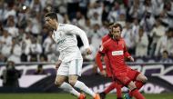Cristiano Ronaldo (L) of Real Madrid in action against David Zurutuza (R) of Real Sociedad during the La Liga match between Real Madrid and Real Sociedad at the Santiago Bernabeu Stadium in Madrid, Spain on February 10, 2018. ( Burak Akbulut - Anadolu Age