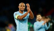 Manchester City's Vincent Kompany applauds fans after the match. Reuters/Andrew Boyers
