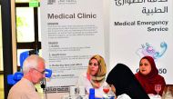 Health experts attending to a visitor during the event.