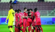 Al Duhail players celebrate after winning their QNB Stars League (QSL) match against Umm Salal yesterday.