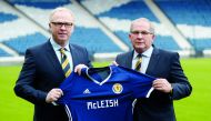 Scotland manager Alex McLeish and Alan McRae pose for a photograph. Reuters/Russell Cheyne