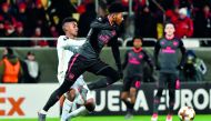 Arsenal's Ainsley Maitland-Niles (R) and Ostersund's Tesfaldet Tekie vie for the ball during the UEFA Europa League round of 32, first leg football match of Ostersund FK vs Arsenal FC on February 15, 2018 in Ostersund, Sweden.  AFP / TT News Agency / Robe