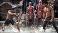 A still of the actors Chadwick Boseman (L) and  Michael B. Jordan (R) from the movie Black Panther.
