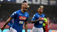Napoli's Slovakian midfielder Marek Hamsik celebrates after scoring a goal before it is disallowed due to offside during the Serie A football match between Napoli and Spal at San Paolo Stadium Stadium in Naples on February 18, 2018. / AFP / TIZIANA FABI