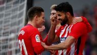 Atletico Madrid's Diego Costa celebrates scoring their second goal with Antoine Griezmann and Kevin Gameiro REUTERS/Javier Barbancho
