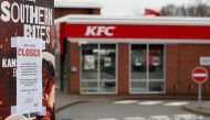 A closed sign hangs on the drive through of a KFC restaurant after problems with a new distribution system in Coalville, Britain, February 19, 2018. Reuters/Darren Staples