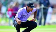 Shubhankar Sharma of India plans his next move on the greens at the Qatar Masters golf tournament at the Doha Golf Club yesterday.
