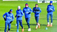Paris Saint-Germain's Brazilian defender Thiago Silva, Paris Saint-Germain's midfielder Lassana Diarra, Paris Saint-Germain's Italian midfielder Thiago Motta and Paris Saint-Germain's French forward Kylian Mbappe take part in a training session in Saint-G