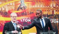UEFA director of competitions Giorgio Marchetti (L) and Barcelona and Lyon's former player Eric Abidal attend the draw for the round of 16 of the UEFA Europa League football tournament at the UEFA headquarters in Nyon, Switzerland, on February 23, 2018.  