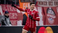Bayern Munich's Polish forward Robert Lewandowski celebates afer he scored a goal during the UEFA Champions League round of sixteen first leg football match Bayern Munich vs Besiktas Istanbul on February 20, 2018 in Munich, southern Germany. AFP / Sven Ho