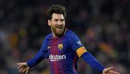 Barcelona's Argentinian forward Lionel Messi celebrates after scoring his second goal during the Spanish league football match between FC Barcelona and Girona FC at the Camp Nou stadium in Barcelona on February 24, 2018. / AFP / LLUIS GENE
