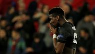 Manchester United's Paul Pogba looks dejected after the match REUTERS/Jon Nazca
