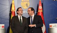 Spanish Prime Minister Mariano Rajoy (L) speaks with his Tunisian counterpart Youssef Chahed after their meeting on February 26, 2018 in Tunis. AFP / Fethi Belaid