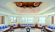 A view of a majlis-style meeting room at Banana Island Resort Doha by Antara.
